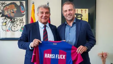 Hansi Flick y Laporta en la presentación del DT.